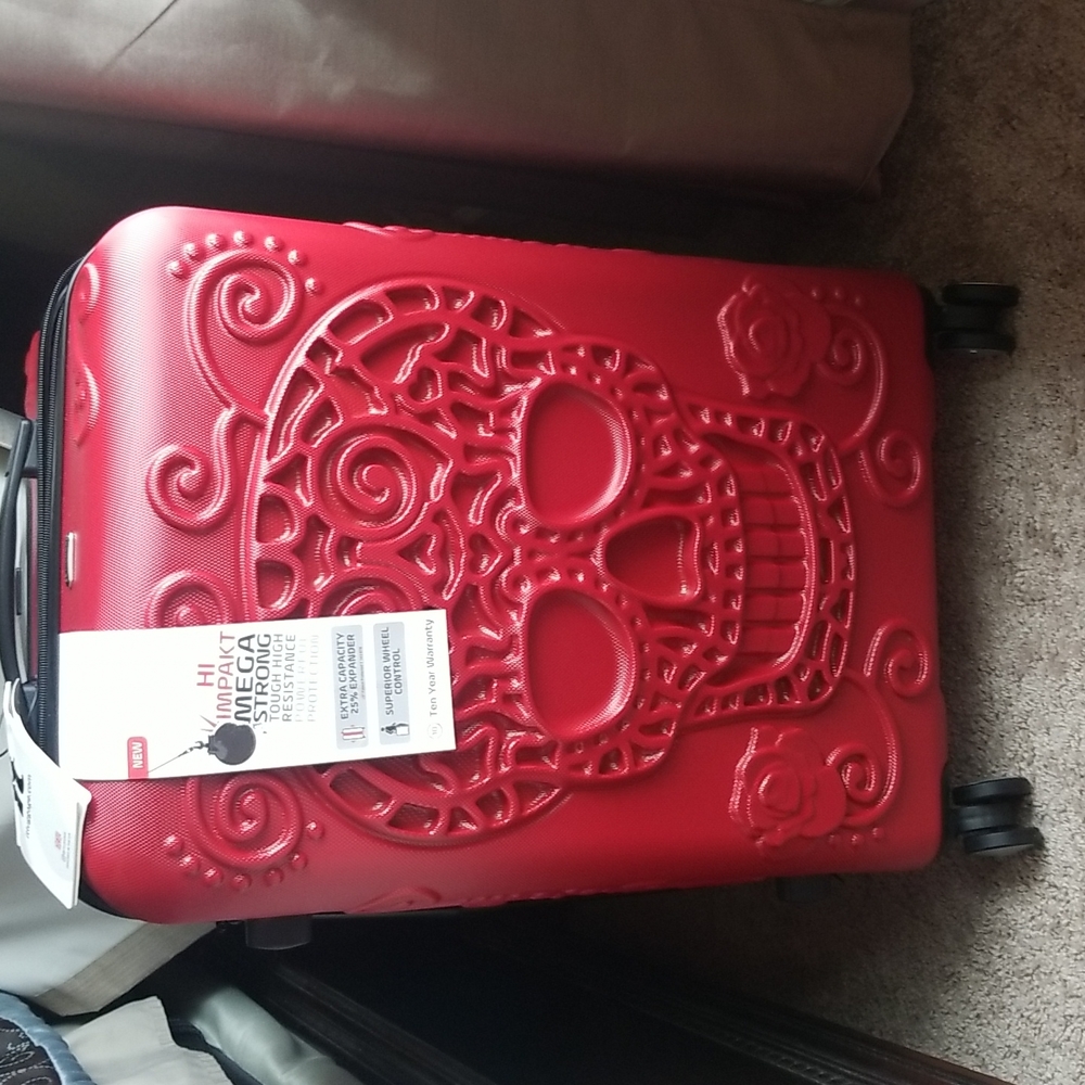 SUGAR SKULLS.... IT luggage red hardside roller rare skull Calavera